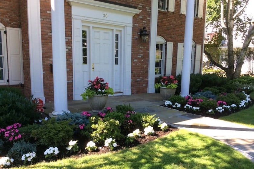 Landscape Design -Boxwoods and impatiens in Scarsdale