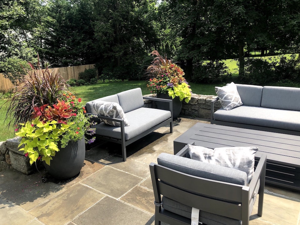 Outdoor room with large planters