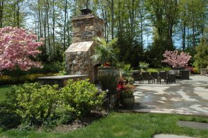 A collection of well placed planted containers put the finishing touches on their outdoor room