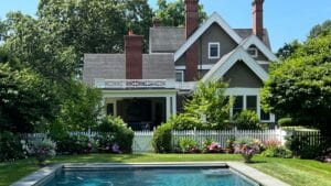 Pool surrounded by Lush Shrubs and Colorful Annuals
